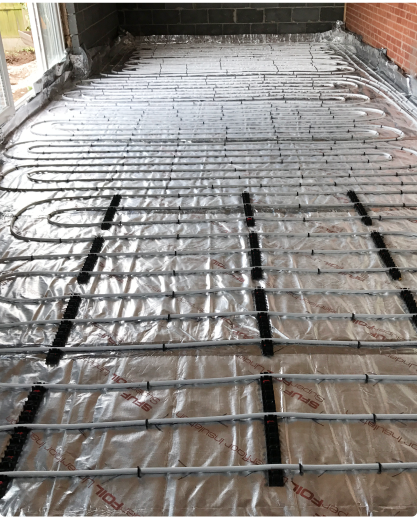 SuperFOIL SFUF installed beneath an underfloor heating system.